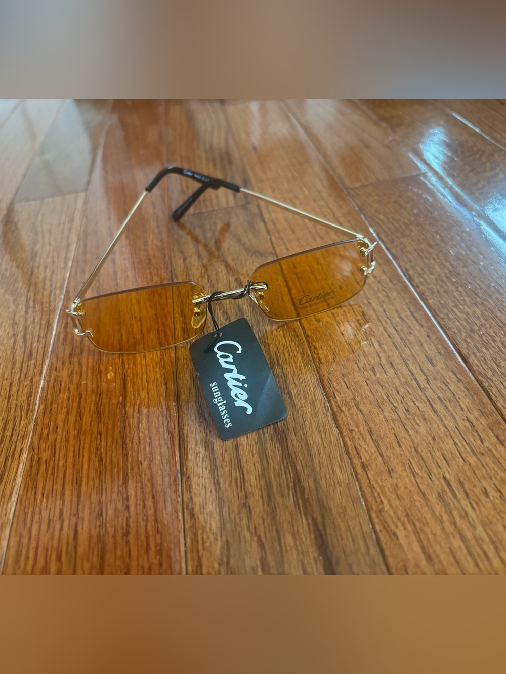 Cartier Men’s Gold Frame Sunglasses with Amber Lenses